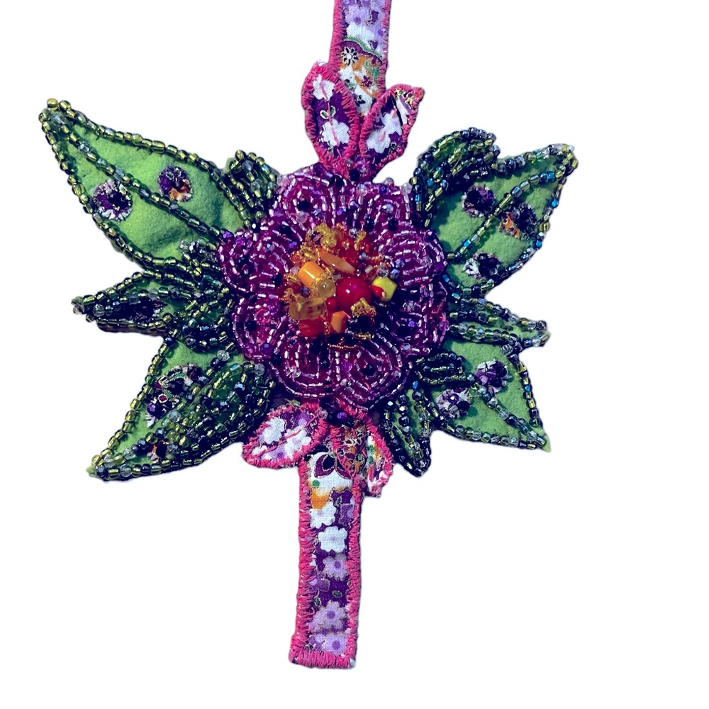 Hand-crafted bead embroidered cuff bracelet.
